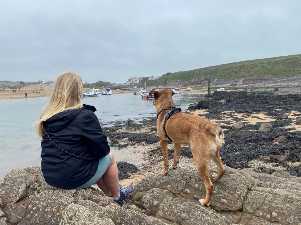 Gemma with her dog on the beach