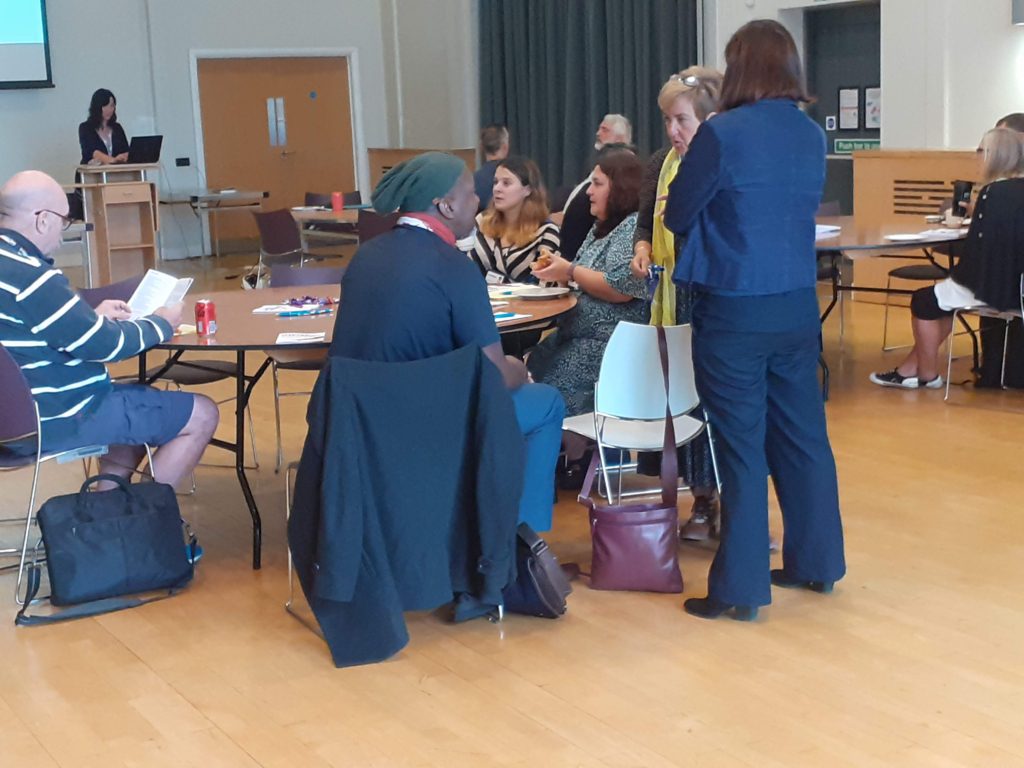 Beresford Lee, speaking with Andrea and Heidi before the AGM