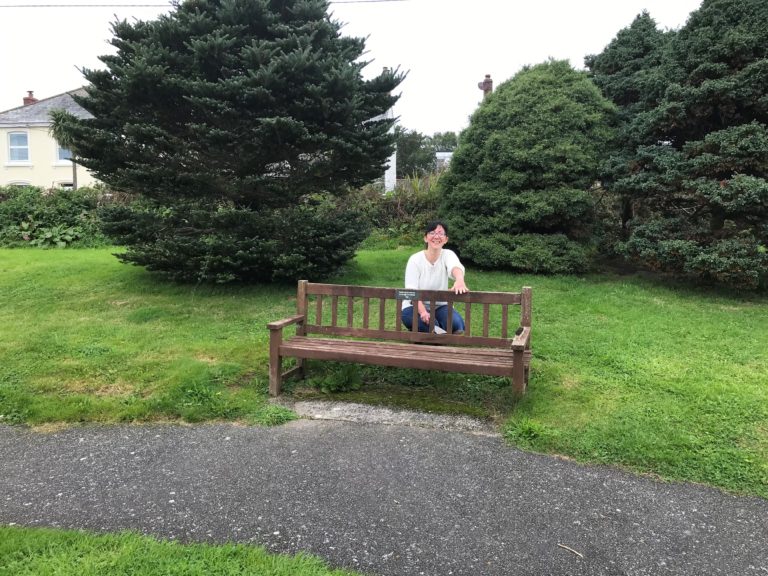 Sapphire painting the bench at Breage