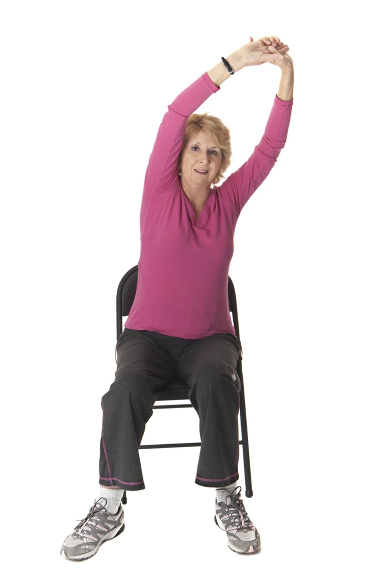 older lady exercising in a chair